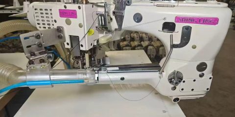 Flat seamer sewing machine 4 needle 6 thread feed off the arm interlock Shing Ling brand serviced by Tomsewing