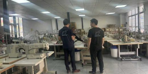  Tomsewing service center with flat seamer machines ready for Indian yoga wear factory customers.